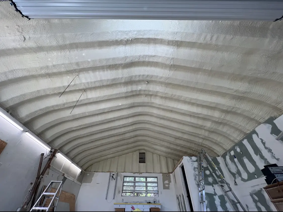 Spray polyurethane foam applied to the underside of a metal roof deck in Park City